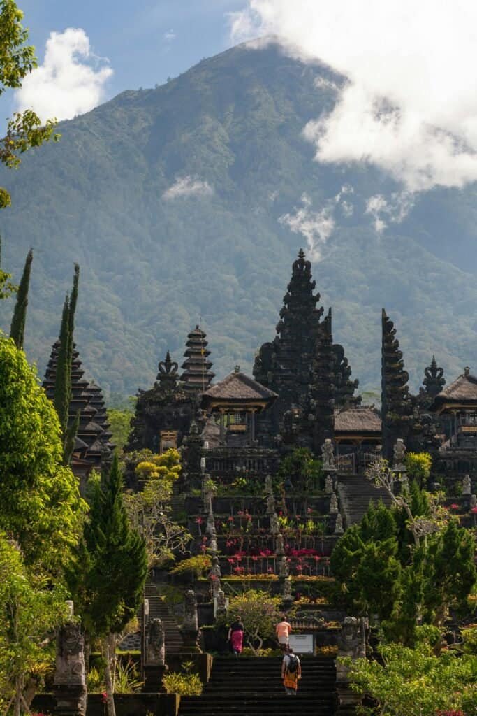 Good Destino Bali 5 Bali Unplugged: A Journey Through Temples, Jungles, and Tranquility Tanah Lot Temple Bali – dramatic ocean sunset view of one of Bali’s most iconic sea temples.