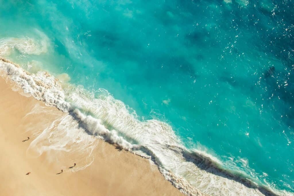 pexels apasaric 2707756 Bali Unplugged: A Journey Through Temples, Jungles, and Tranquility Bali travel guide aerial view of tropical beach and jungle