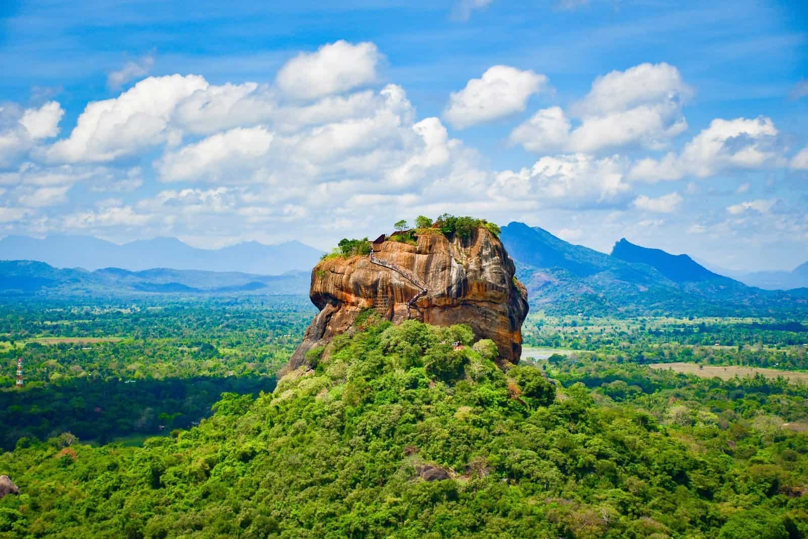 Scenic view of Sigiriya Rock Fortress in Sri Lanka surrounded by lush jungle scaled Sri Lanka Travel Guide 2025 – Best Places to Visit & Top Things To Do Scenic view of Sigiriya Rock Fortress in Sri Lanka surrounded by lush jungle
