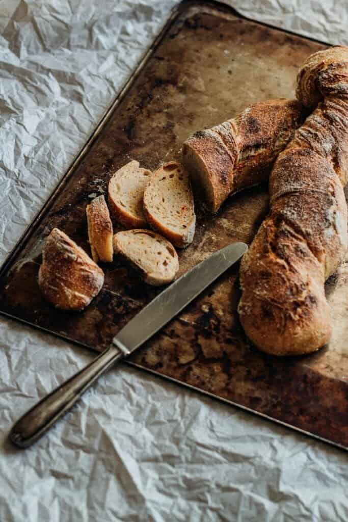 freshly baked baguettes Discovering the Magic of Paris: The City of Lights freshly baked baguettes : Traditional French food in Paris – best places to eat and local cuisine guide