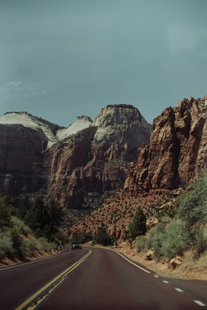 Asphalt road through mountainous terrain, USA