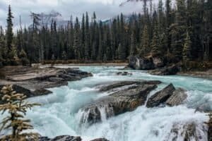 Beautiful Landscape of a Creek and Mountains in Distance, Canada