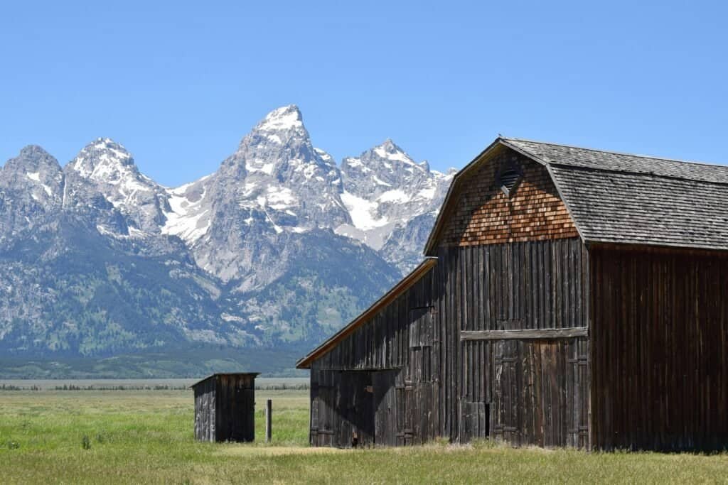 Brown Wooden Shed Near Mountain, USA
