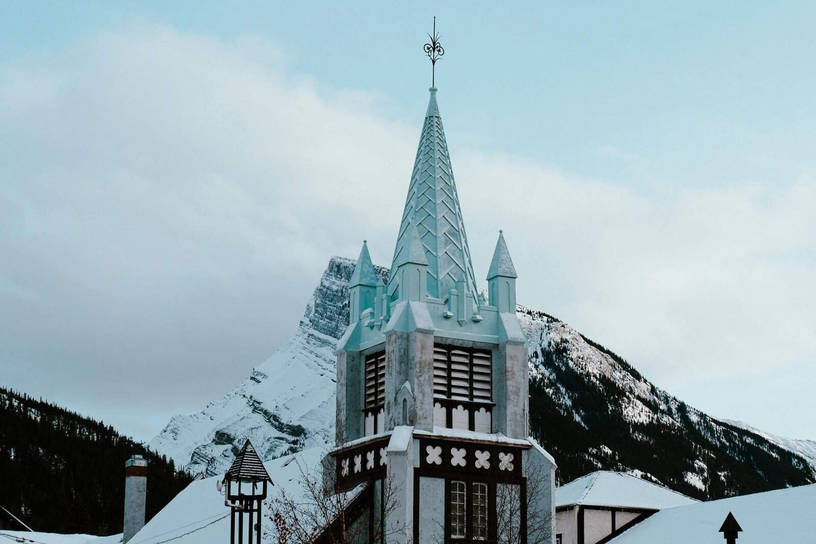 Historic Church Steeple in Snowy Banff Landscape, Banff, Alberta, Canada