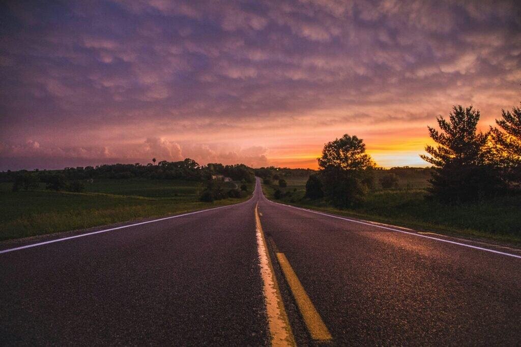 Photo of Empty Road In Between Grass Field During Golden Hour, MN, USA