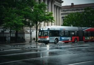 Rainy Washington DC Street with Metrobus in Focus, Washington, DC, USA