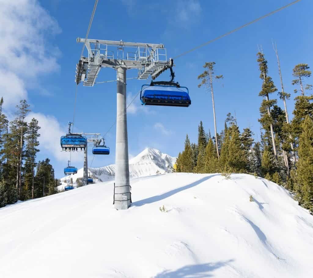 Ski Lift and Snowy Mountains at Big Sky Resort, Montana, United States