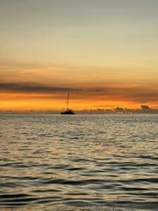 Sailboat on Ocean at Sunset, Mauritius