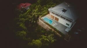 White and Grey House With A Pool Surrounded By Vegetation, Anse Royale, Seychelles