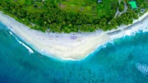 Aerial Shot Of Green Island and White Sandy Beach, Maldives