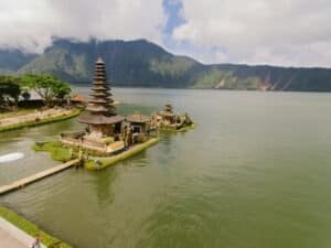 A stunning aerial view of Pura Ulun Danu Bratan Temple situated by a serene lake in the highlands of Bali, Indonesia