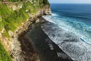 Breathtaking view of Uluwatu cliffs and ocean waves in Bali