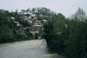 Charming hillside houses in Kutaisi overlooking a river, Kutaisi, Georgia