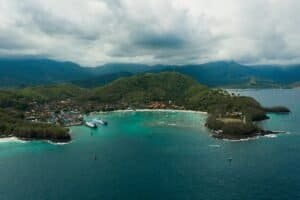 Stunning aerial view of Padang Bai Beach and coastline showcasing Balis vibrant landscape and turquoise sea Bali Budget Travel Guide 2026: Travel Bali Cheap Under $50/Day Stunning aerial view of Padang Bai Beach and coastline, showcasing Bali's vibrant landscape and turquoise sea