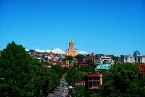 Stunning panorama of Tbilisi cityscape featuring the Holy Trinity Cathedral, Georgia