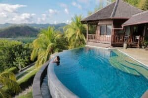 a infinity pool overlooking tropical scenery, Bali