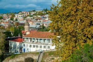 view of a Georgian town with autumn foliage and historic architecture, Georgia